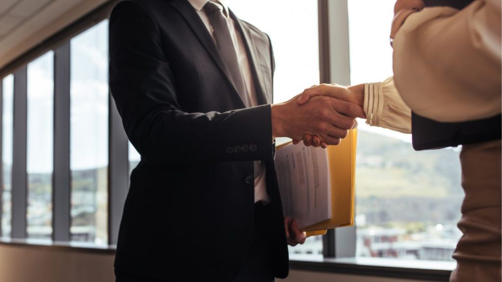 two professionals shaking hands