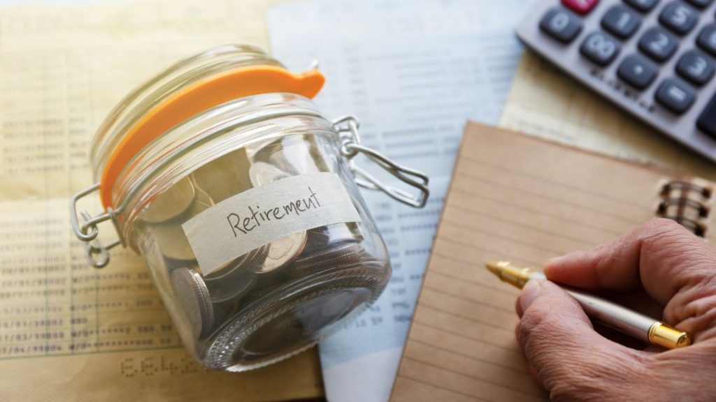 jar of coins labeled retirement