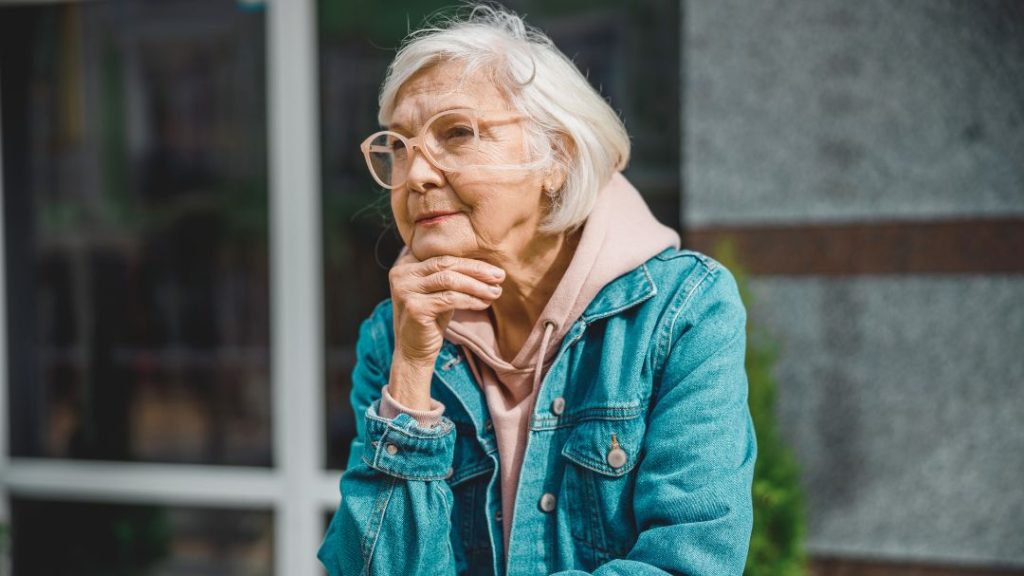 elderly woman thinking